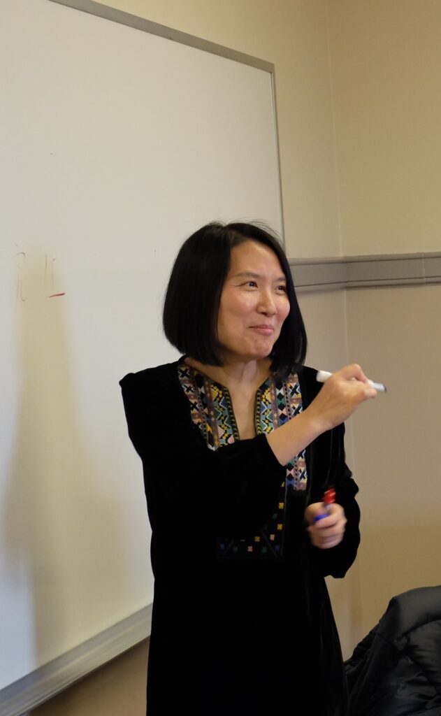 Professor Luo teaches new vocabulary to her students
