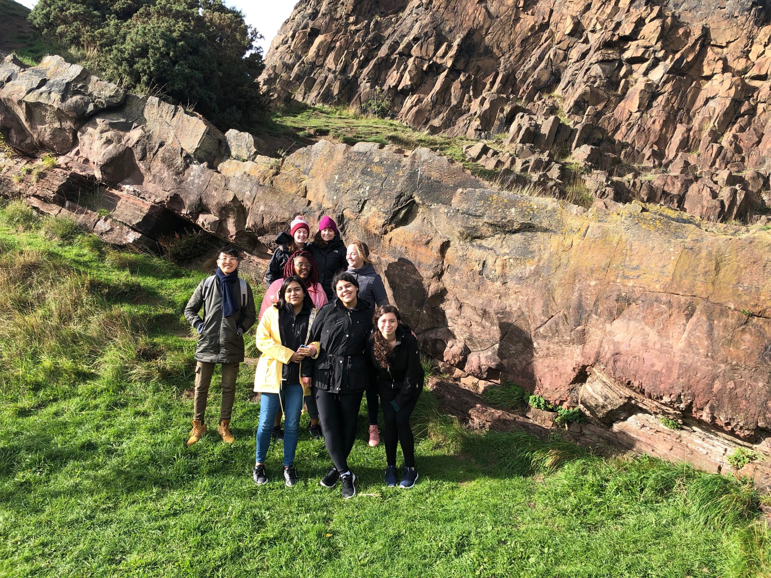 Geology students studying earth history in Edinburgh, Scotland.